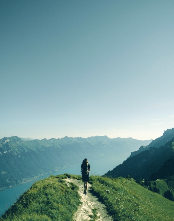 Hiker walking on a ridge